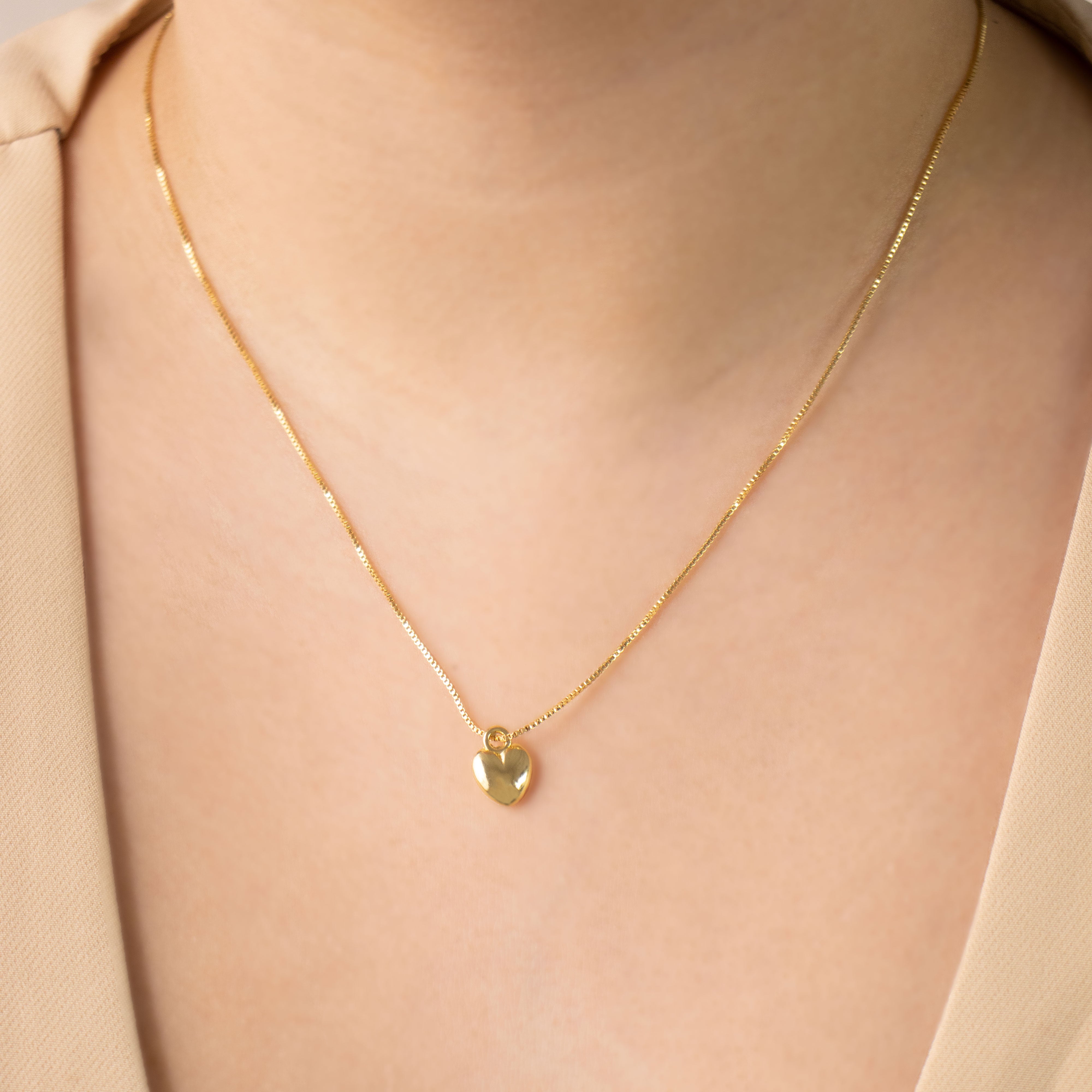 DIJE MINI CORAZON LISO BAÑO EN RODIO