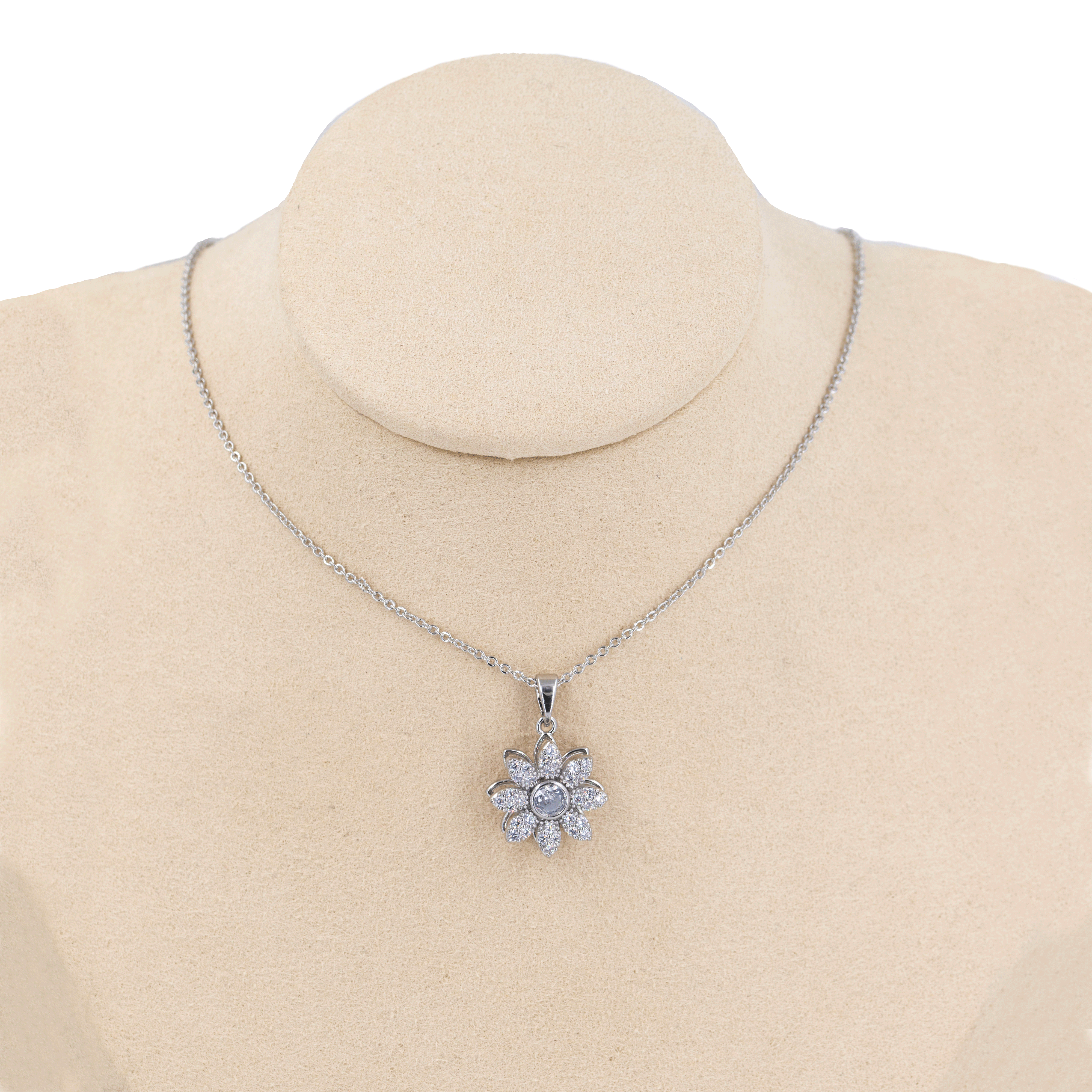 DIJE GIRATORIO FLOR BLANCA EN RODIO