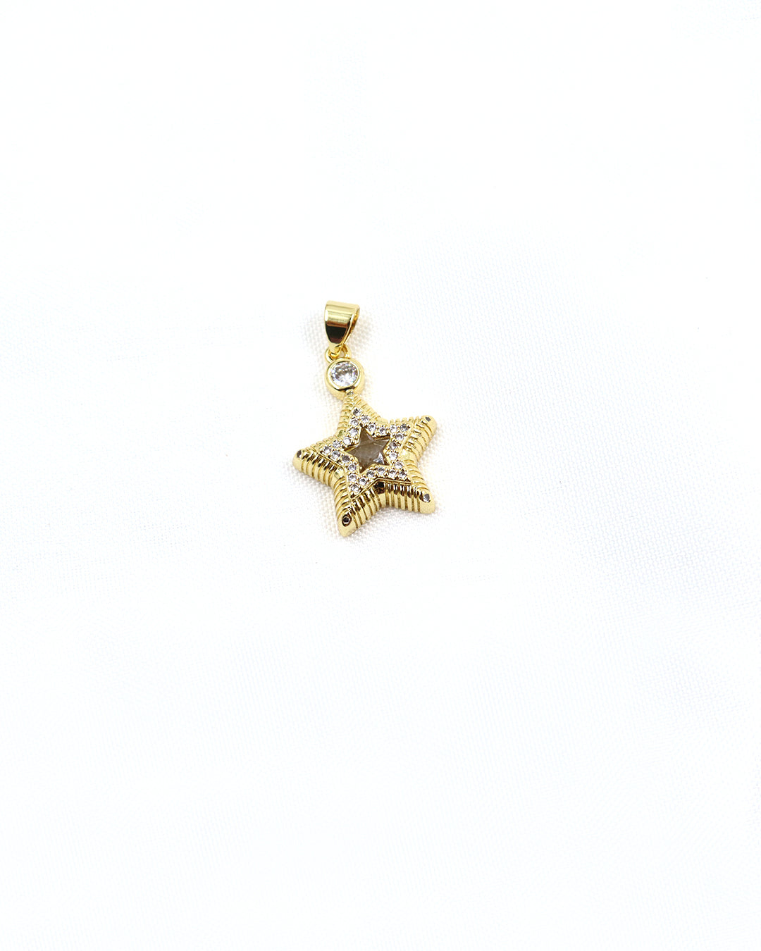 RD-811 DIJE EN RODIO ESTRELLA 2CM