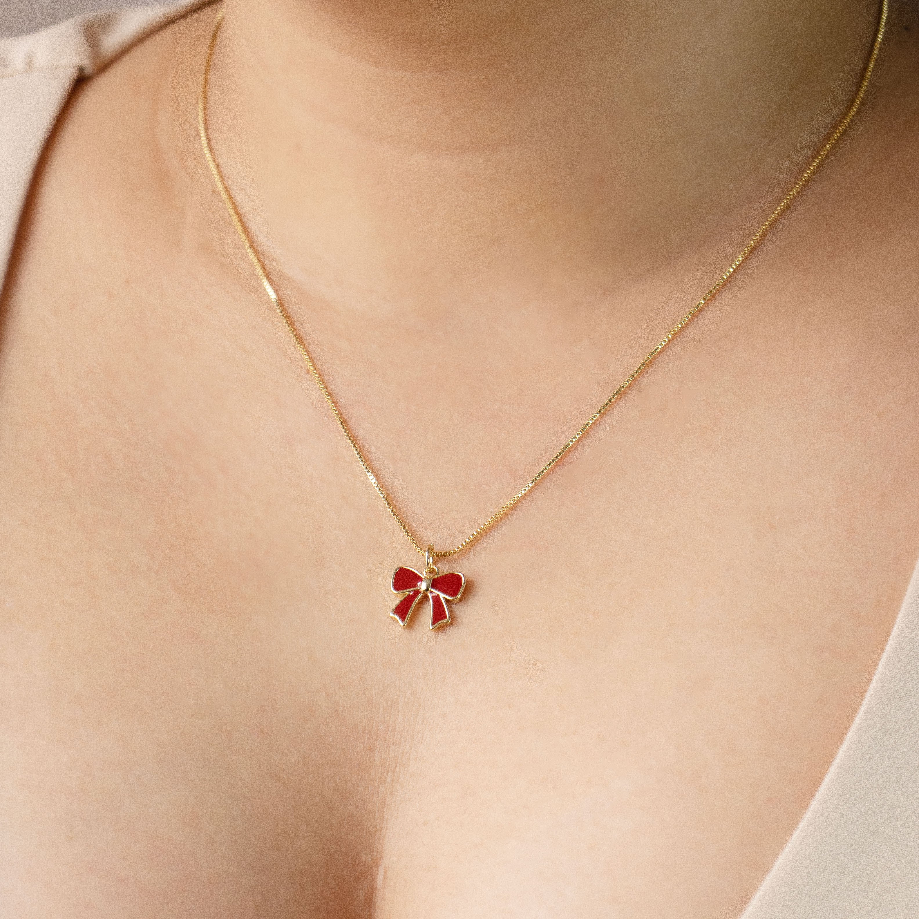 DIJE MOÑO ROJO BAÑO EN RODIO