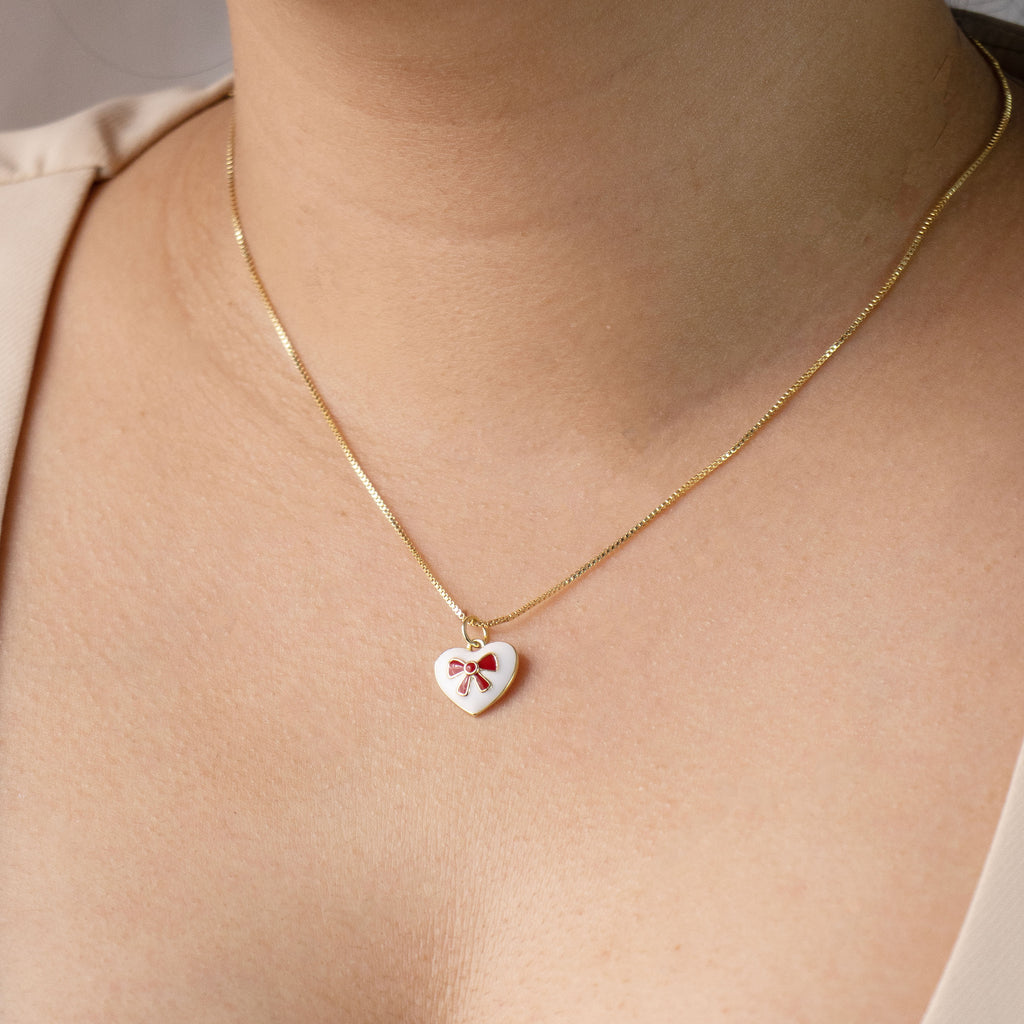 DIJE MOÑO CORAZON BAÑO EN RODIO