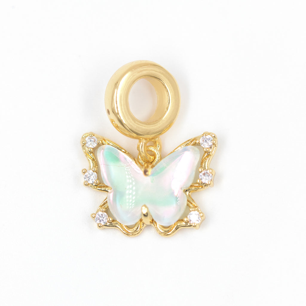 DIJE CHARM MARIPOSA AZUL TORNASOL BAÑO EN RODIO