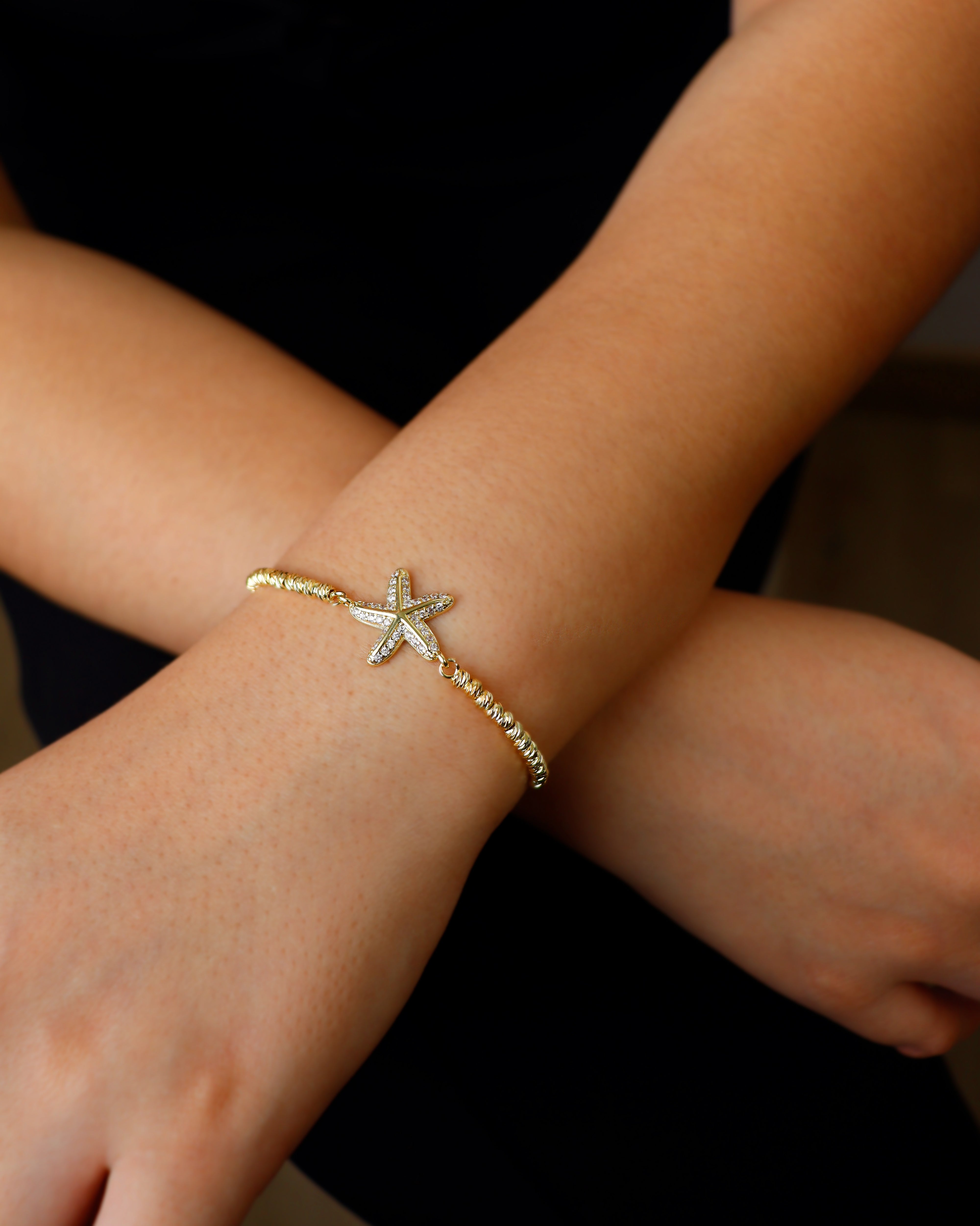 DIJE ESTRELLITA DE MAR CIRCONADA BAÑO EN RODIO