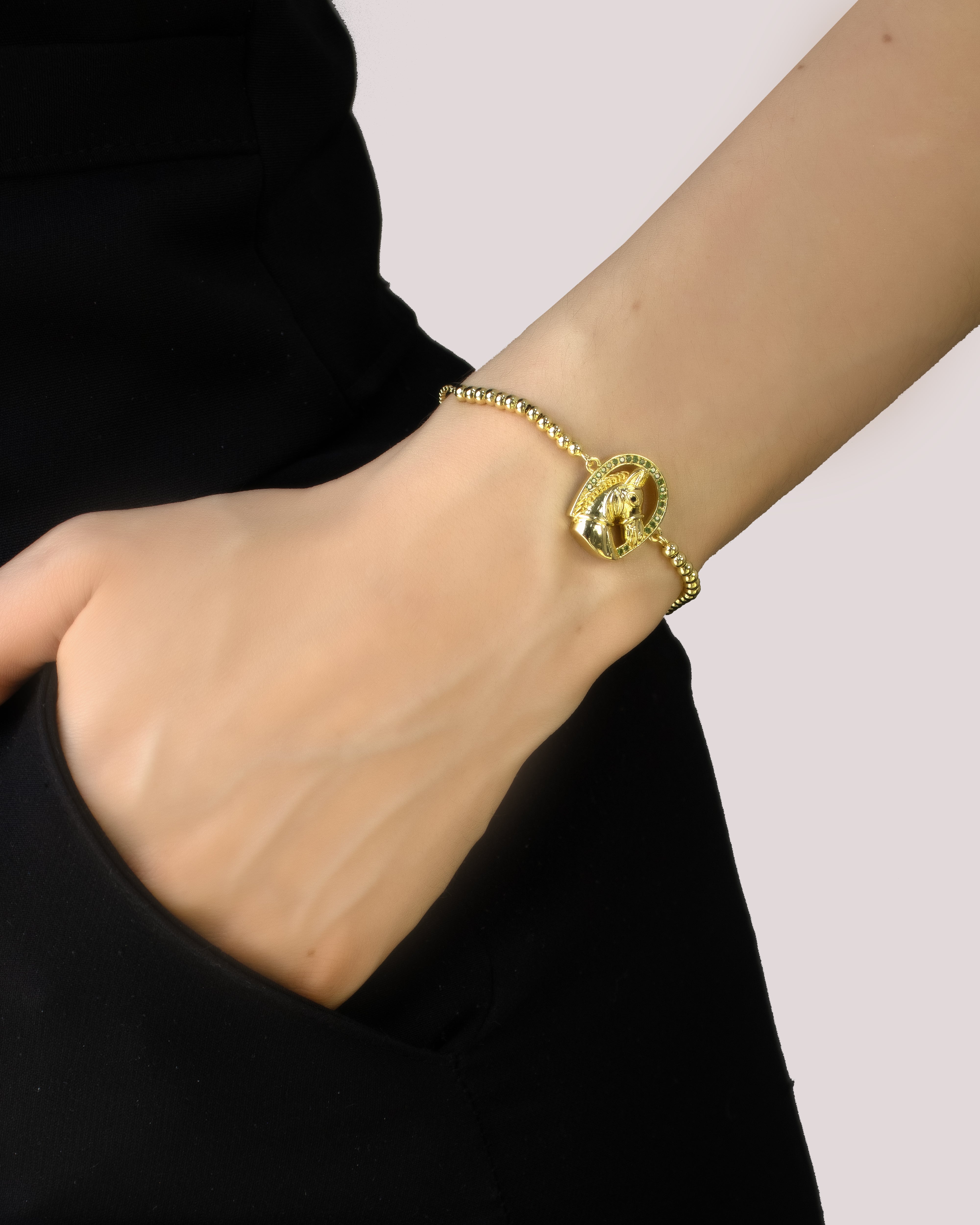 DIJE CABALLITO CIRCONADO VERDE BAÑO EN RODIO