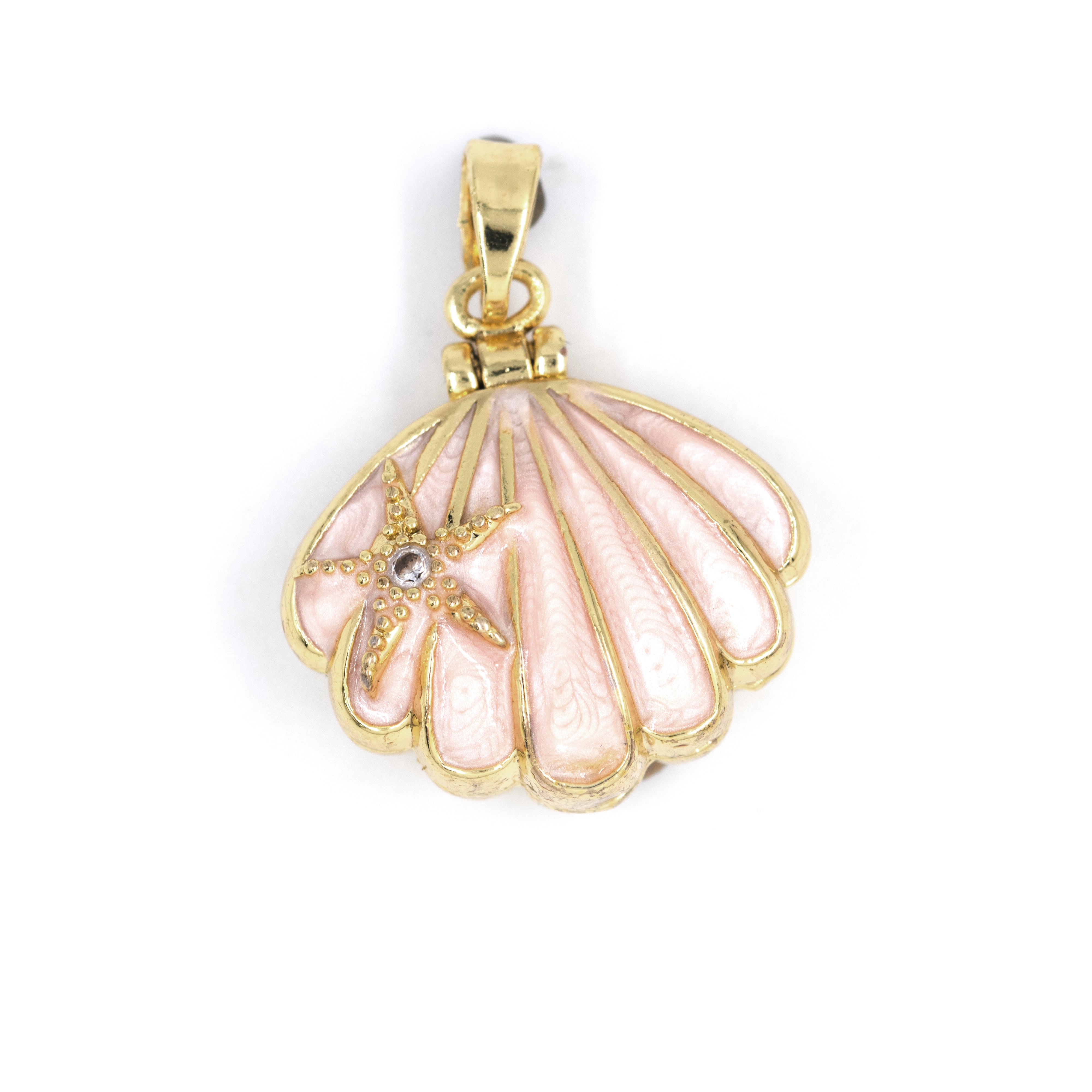 DIJE RELICARIO CONCHA BAÑO EN RODIO