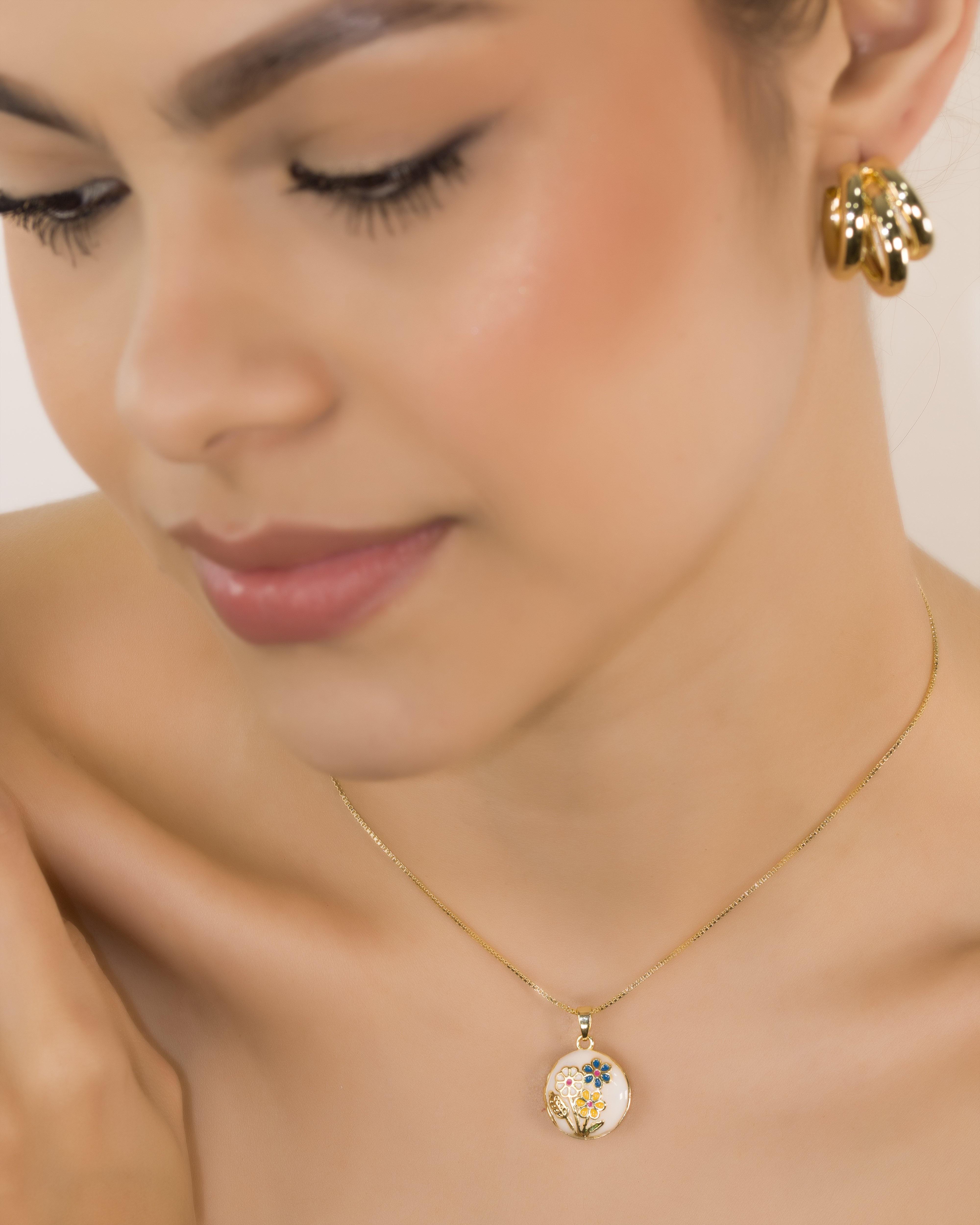 DIJE RELICARIO FLOR ETERNA BAÑO EN RODIO