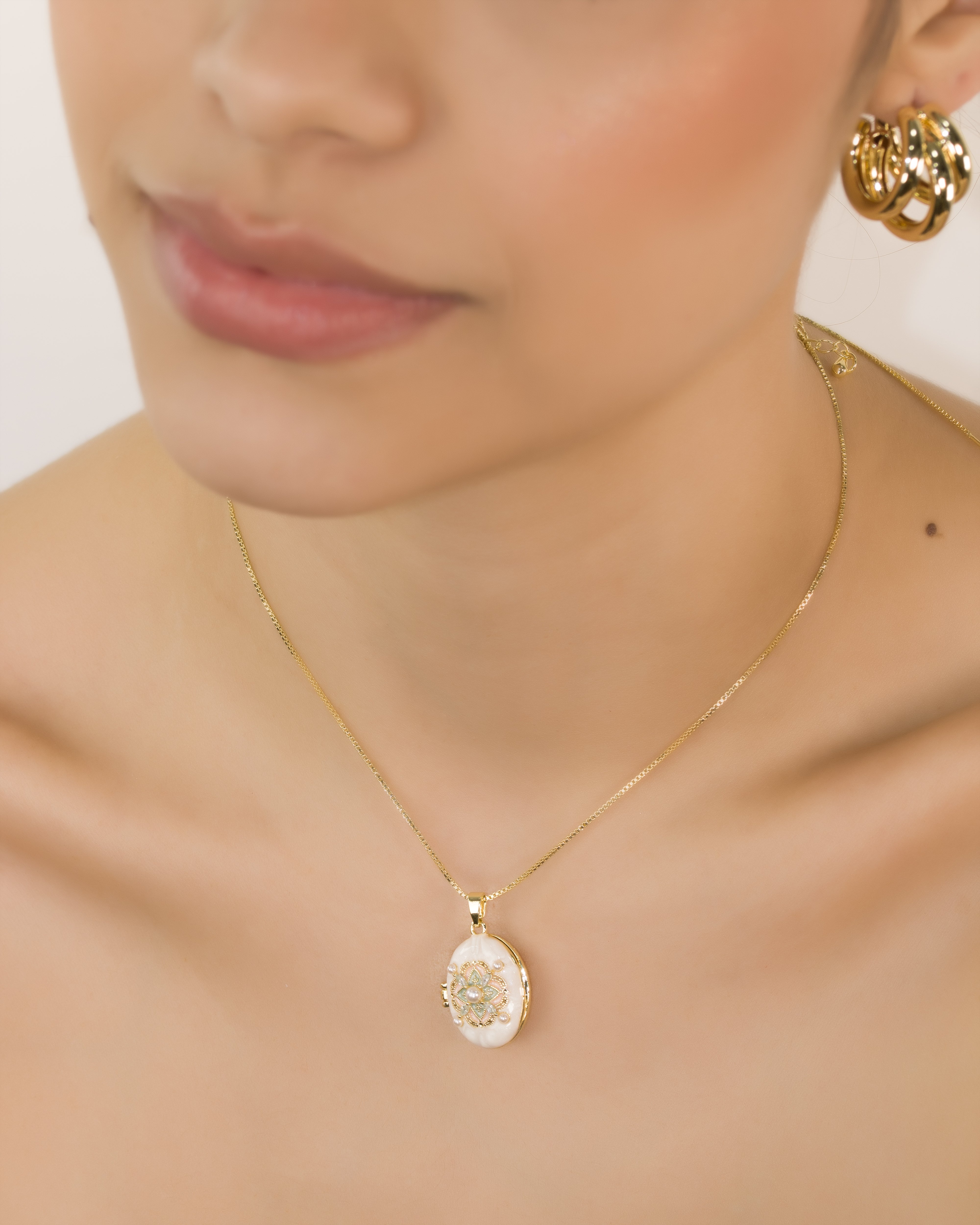 DIJE RELICARIO AVALOR BAÑO EN RODIO