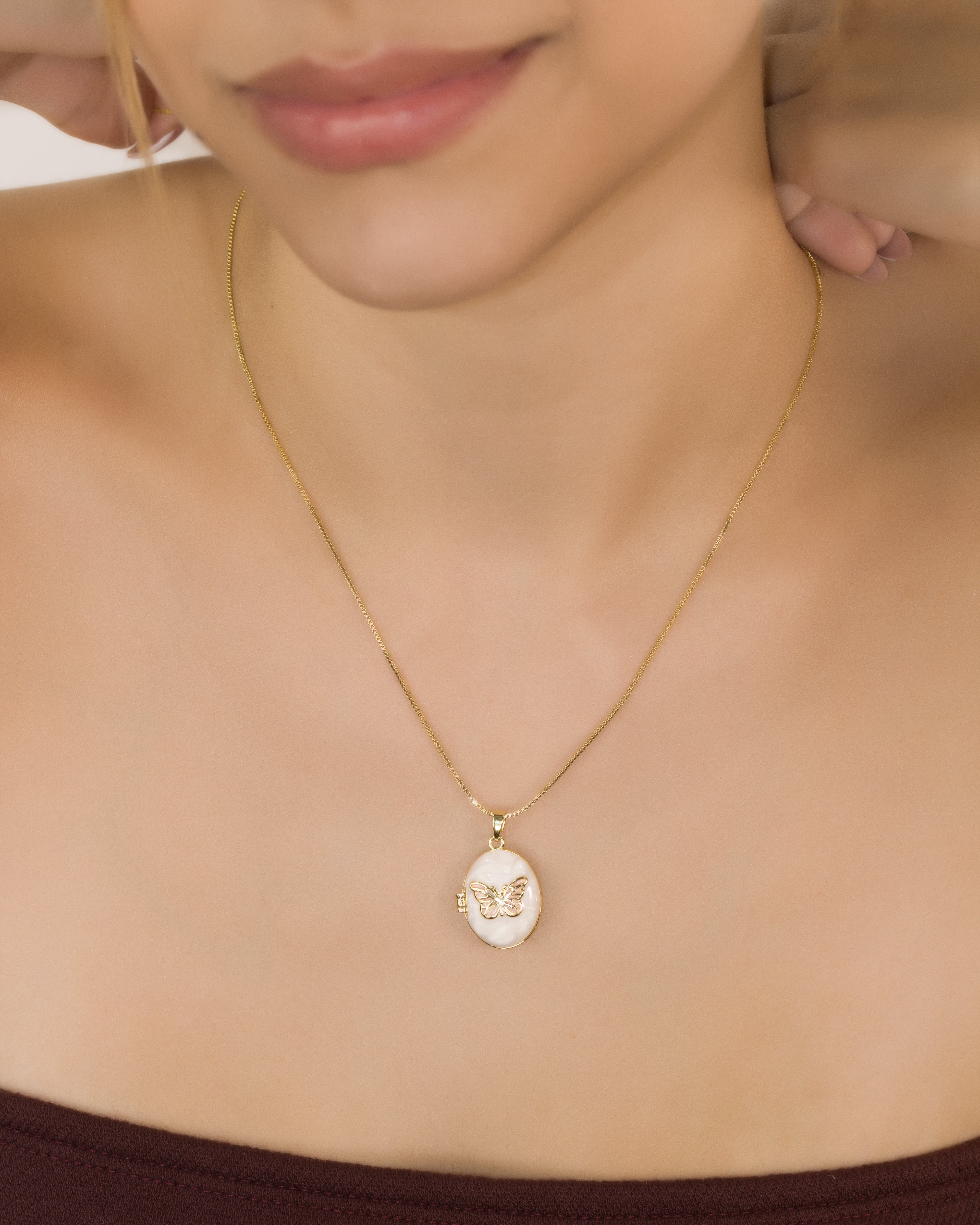 DIJE RELICARIO MARIPOSA ROSA BAÑO EN RODIO