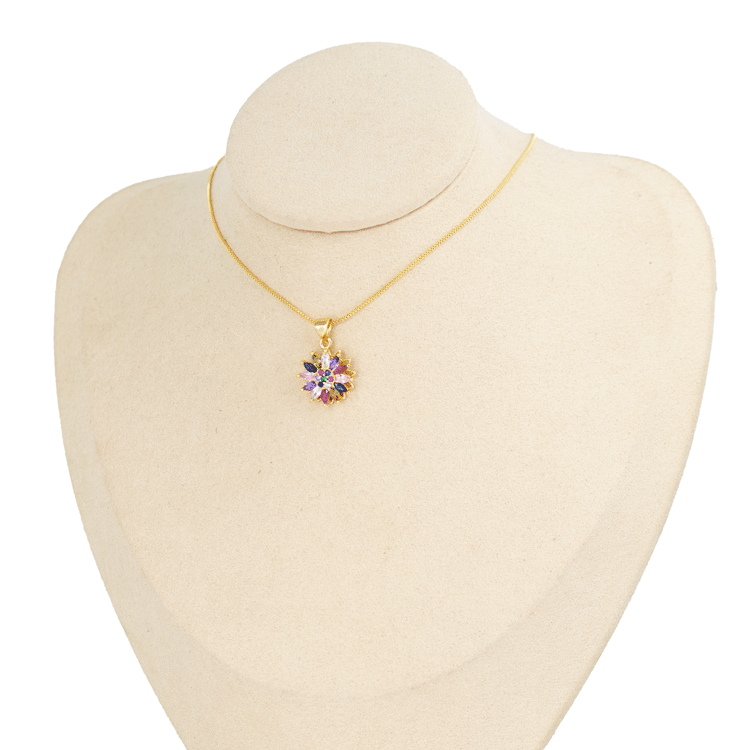 DIJE GIRATORIO FLOR MULTICOLOR BAÑO EN RODIO