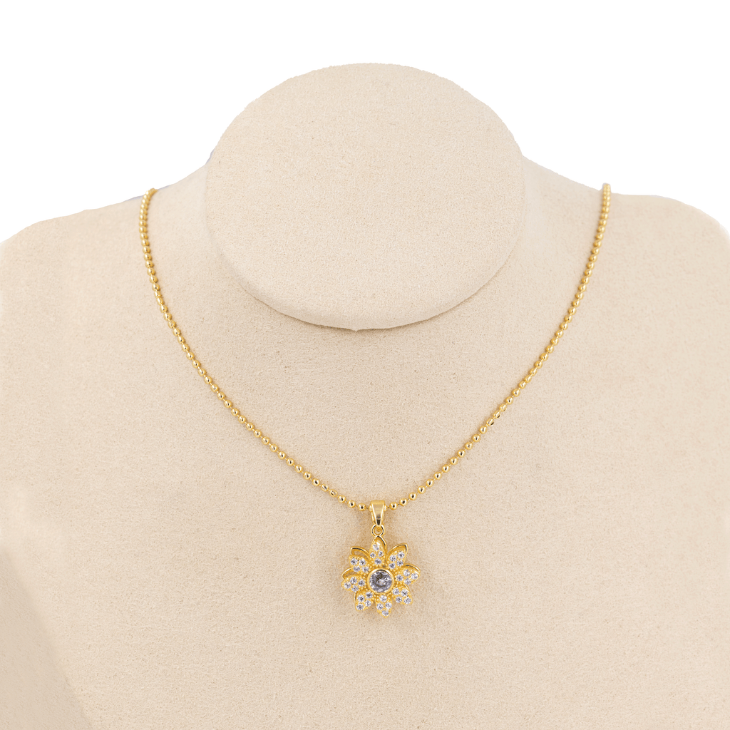 DIJE GIRATORIO FLOR BLANCA EN RODIO