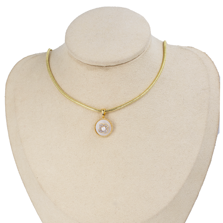 DIJE FLOR PERLA GIRATORIO BAÑO EN RODIO RD-1076