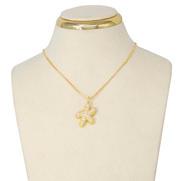 DIJE ESTRELLA PERLA DE MAR BAÑO EN RODIO