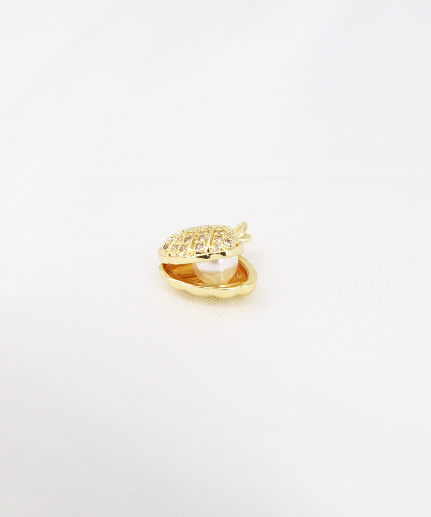 DIJE EN RODIO CONCHA DE MAR